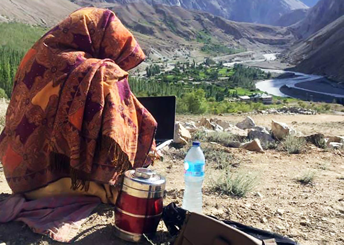 A girl takes online classes Gilgit-Baltistan miles away from home due to bad internet connectivity.